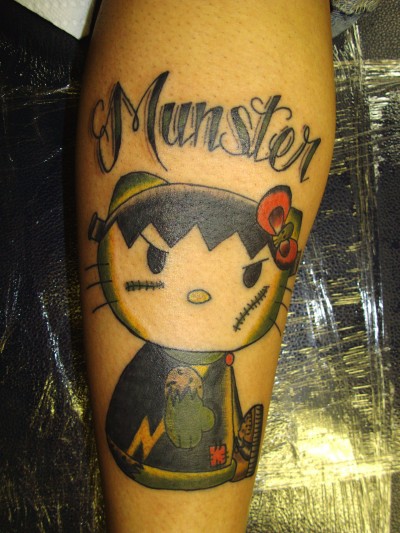 hello kitty Munster tattoo