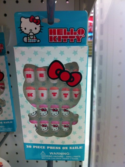 Hello Kitty press on nails that spell Hello Kitty