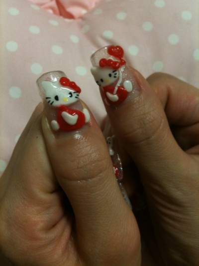 Hello Kitty nails thumbs