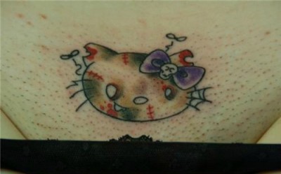 Hello Kitty zombie tattoo below the belt