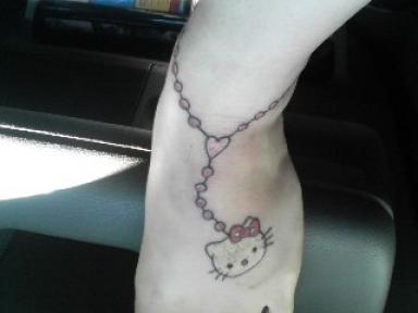 Hello Kitty ankle tattoo