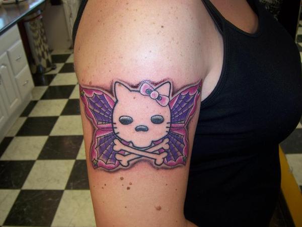 Hello Kitty skutterfly tattoo