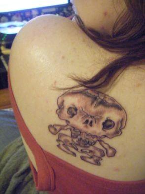 Hello Kitty skeleton tattoo