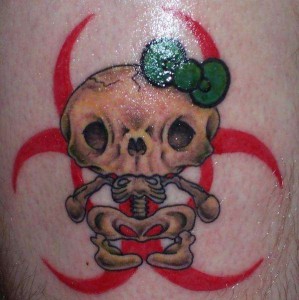 Hello Kitty skeleton tattoo with bow