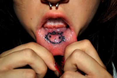 hello kitty tattoo inside mouth