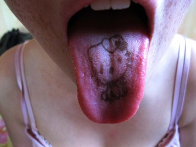 hello kitty tongue tattoo