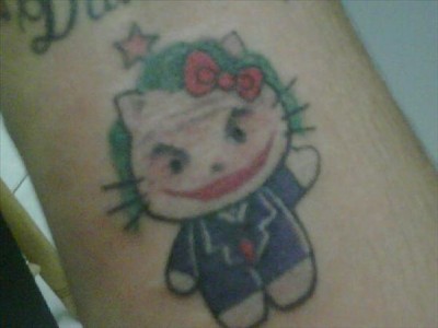hello kitty joker tattoo