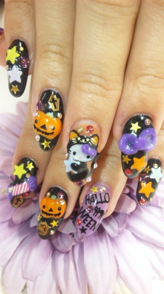 Hello Kitty black cat and pumpkin Halloween finger nail art